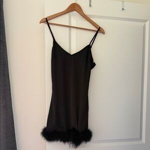 Elegant Black Slip Dress with Feather Trim